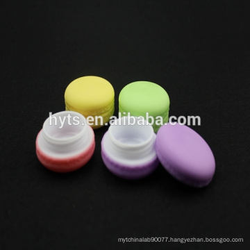 colored food macaron style lip balm container